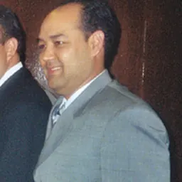 Portrait of Alberto Torrico
