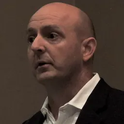 Portrait of Richard Denniss