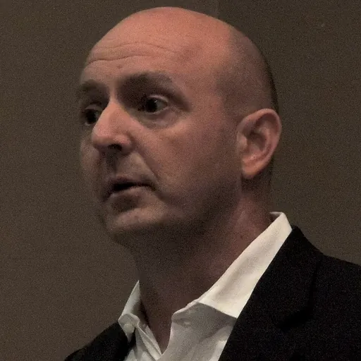 Portrait of Richard Denniss