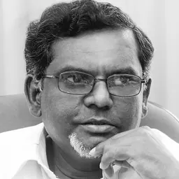 Portrait of Eric Illayapparachchi