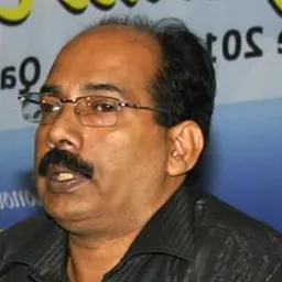 Portrait of Akbar Kakkattil