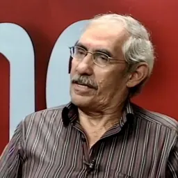 Portrait of Moisés Hassan