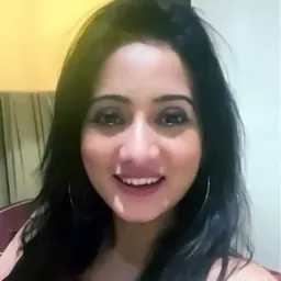Portrait of Harshika Poonacha