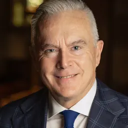 Portrait of Huw Edwards