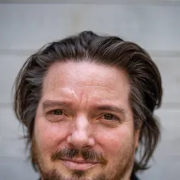 Portrait of Erik J. Larson