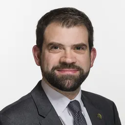 Portrait of Damien Cottier