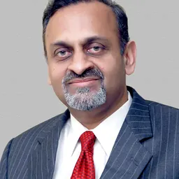 Portrait of Kamlesh Shivji Vikamsey