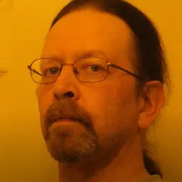 Portrait of John Michael Godier