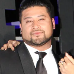 Portrait of John Tui