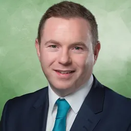 Portrait of Chris Hazzard