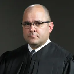 Portrait of Travis Randall McDonough