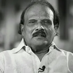 Portrait of Kaloor Dennis