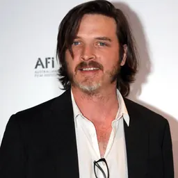 Portrait of Aden Young