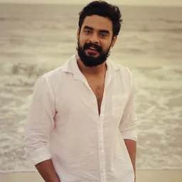Portrait of Tovino Thomas