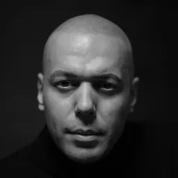 Portrait of Hossein Molayemi