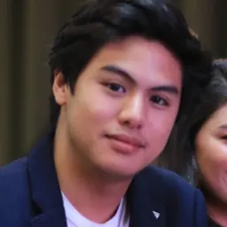 Portrait of Migo Adecer