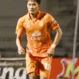 Portrait of Somkid Chamnarnsilp