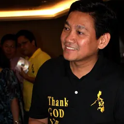 Portrait of Alex Lacson