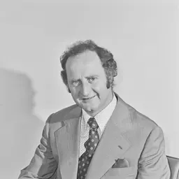 Portrait of Clyde Holding