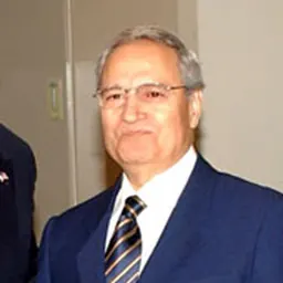 Portrait of Farouk al-Sharaa