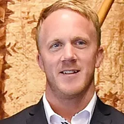Portrait of Corey Peters