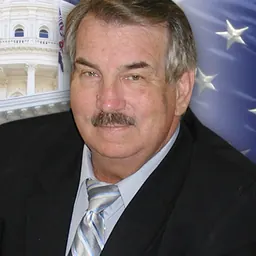 Portrait of Dan Logue