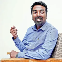 Portrait of John Pradeep