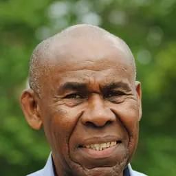 Portrait of Gus John