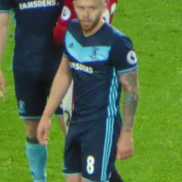 Portrait of Adam Clayton