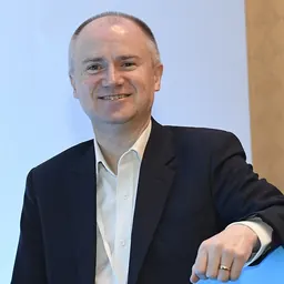 Portrait of Tom Riordan