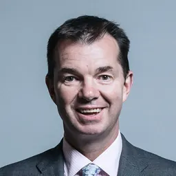 Portrait of Guy Opperman