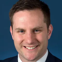Portrait of Alex Hawke