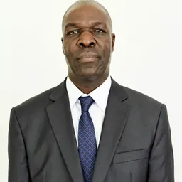 Portrait of Moses Kawumi Kazibwe