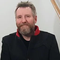 Portrait of Derek Forbes