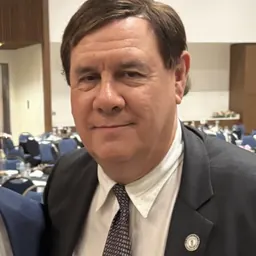 Portrait of Mark Metcalf