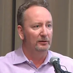 Portrait of Mark Blyth