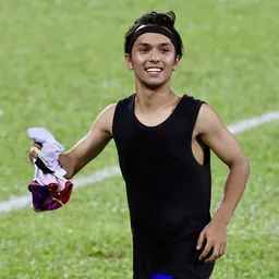 Portrait of Aiman Tino